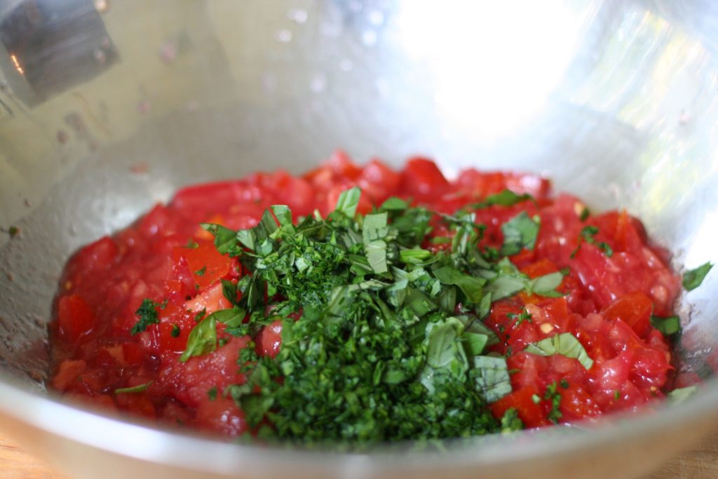 Combining Ingredients for Uncooked Tomato Sauce